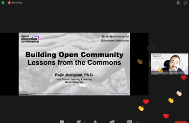 Screenshot of Zoom keynote presentation showing hearts and applause reactions flooding the presenter image of Rajiv Jhangiani.